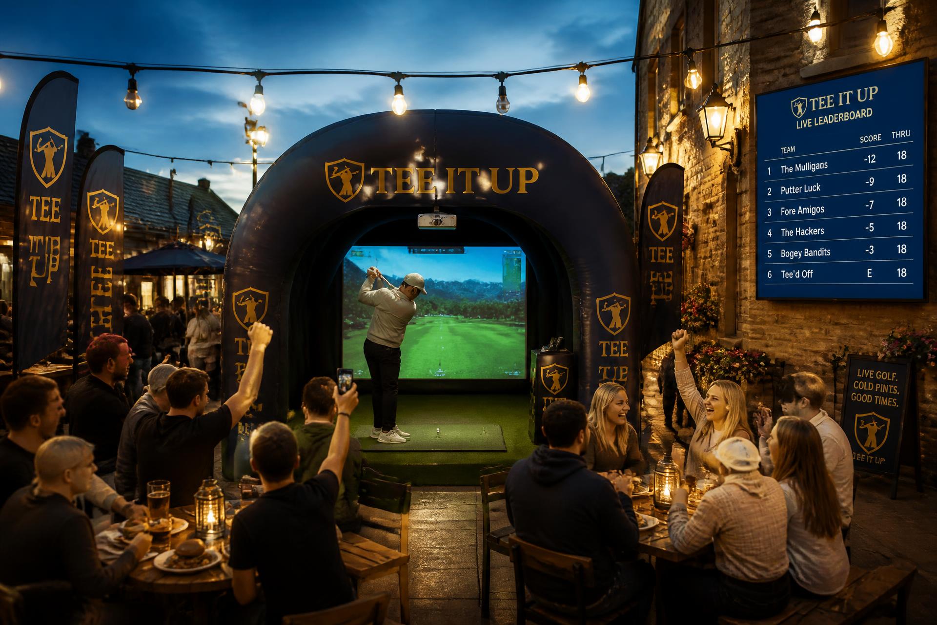 Players and regulars cheering around a portable golf simulator inside a warmly lit British pub, with a live leaderboard on the wall