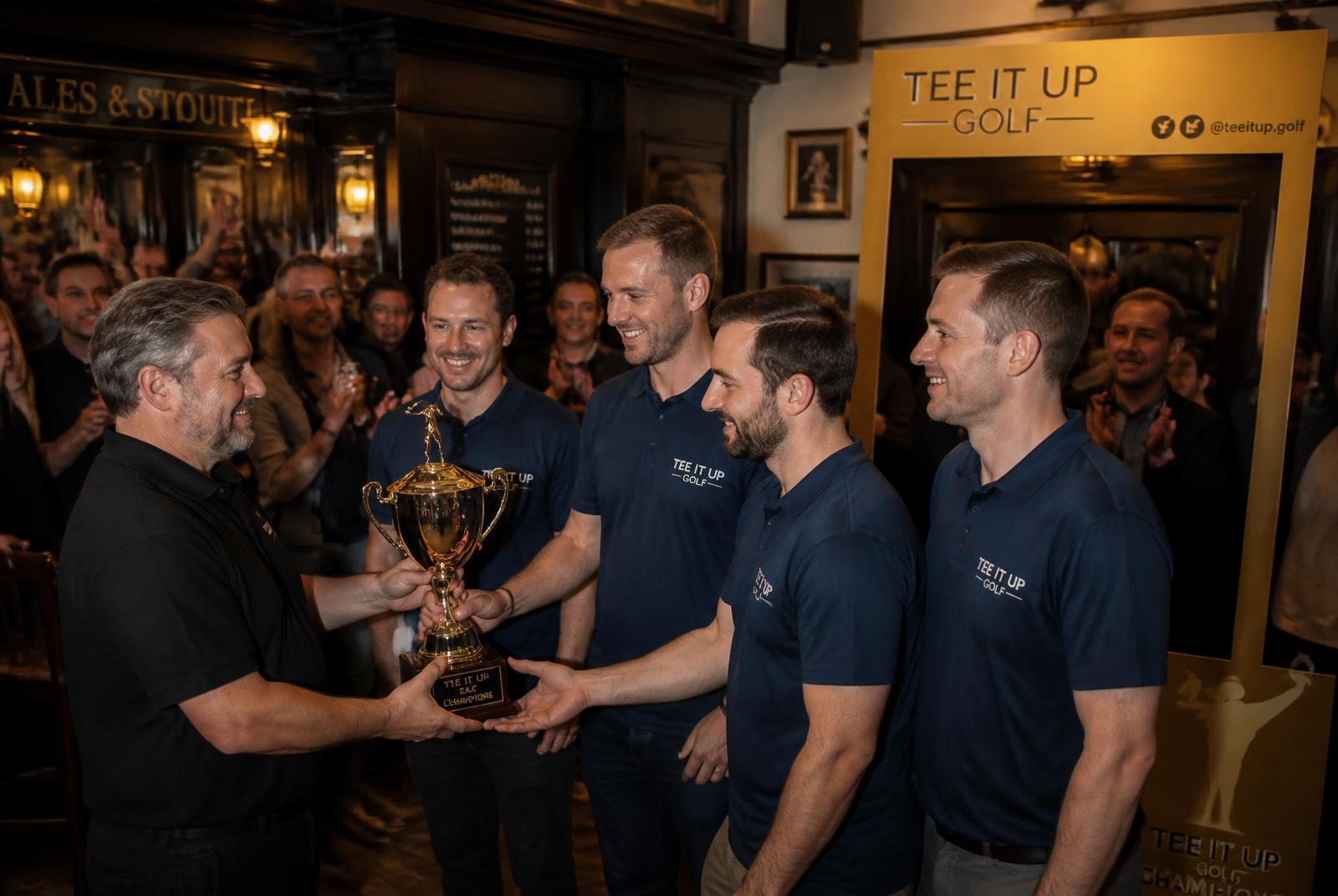 A winning pub team receiving an engraved trophy from their landlord